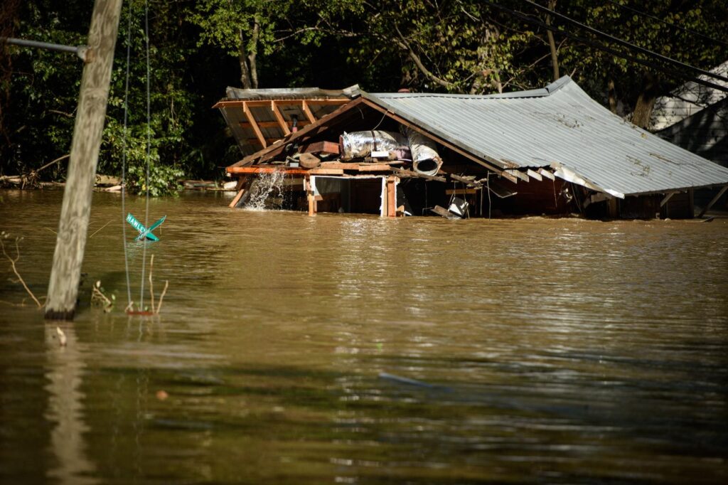 A photo of a flooded mill building near Fayetteville