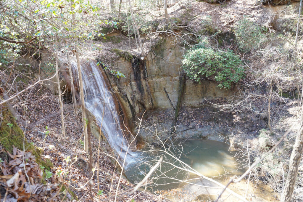 A photo of a waterfall at Clark Park in Fayetteville