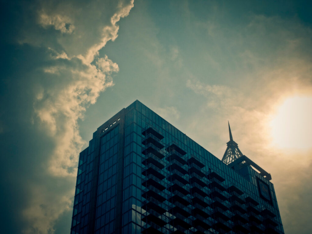 A photo of a skyscraper in downtown Raleigh under the sunshine
