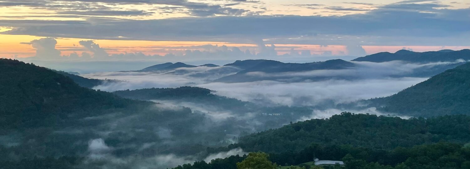 A photo of mist in the Mountains on an early August morning