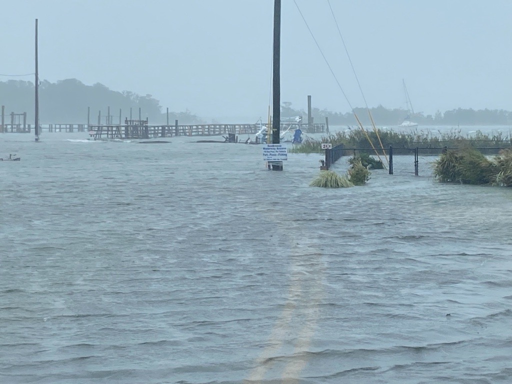A photo of water covering a roadway in New Hanover County during Ian