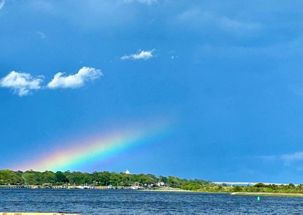 A photo of a rainbow over Sunset Beach, NC