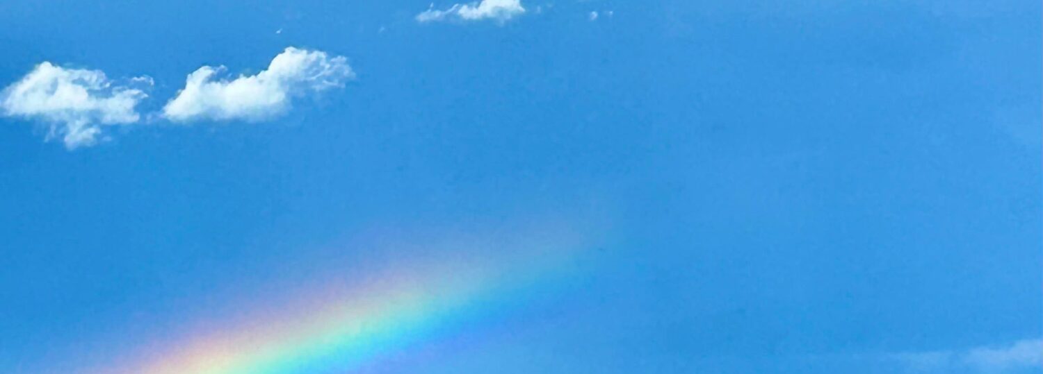 A photo of a rainbow over Sunset Beach, NC