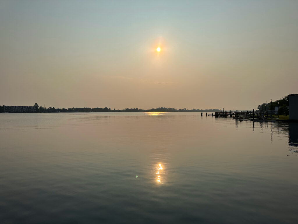 A photo of sunrise over the Pasquotank River on June 16