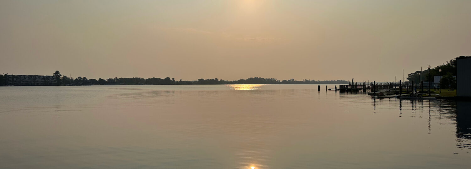 A photo of sunrise over the Pasquotank River on June 16