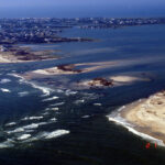 An aerial photo of the inlet in Hatteras Island cut by Hurricane Isabel in 2003