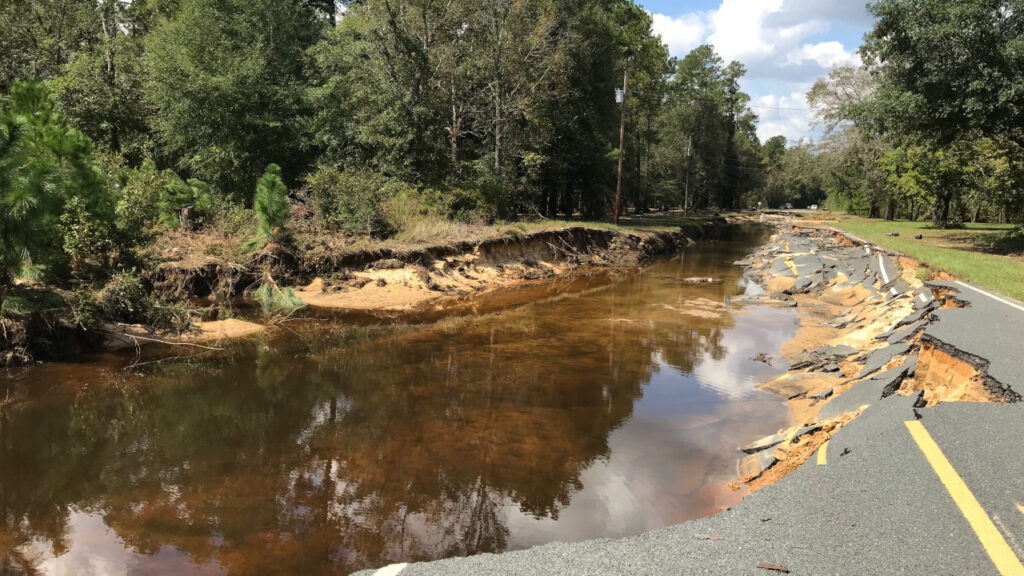 A photo of a damaged and flooded road in Bladen County after Florence