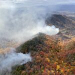 A photo of the Collett Ridge wildfire burning in the mountains of Cherokee County