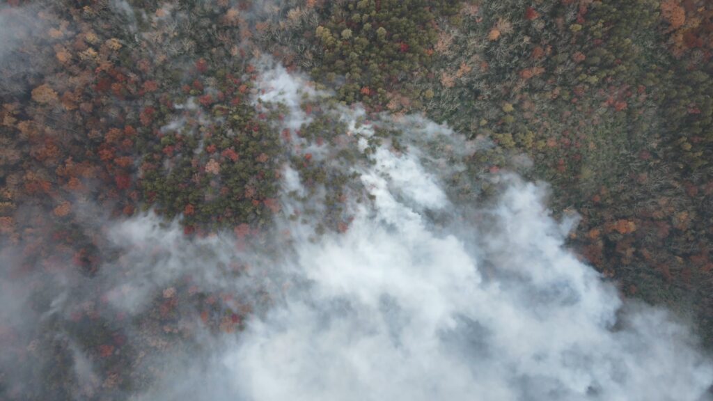 An aerial photo of smoke from the Collett Ridge wildfire