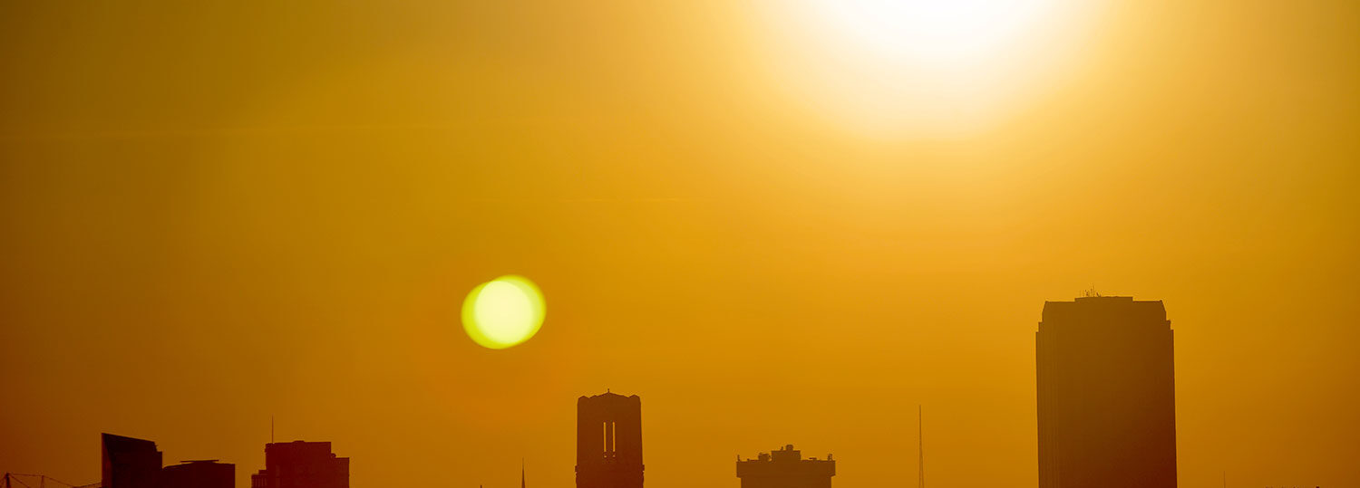 The sun over NC State's campus