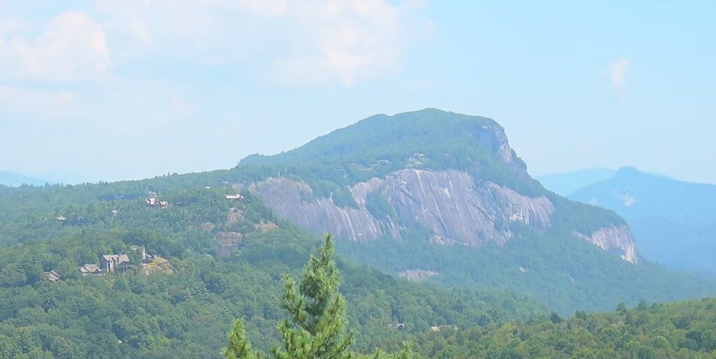 A photo of a misty sky over Whiteside Mountain on August 27