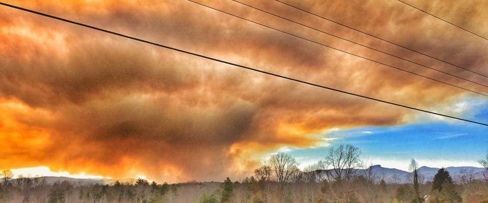 A photo of smoke from the Linville Gorge wildfire in March 2017 over Burke County, NC