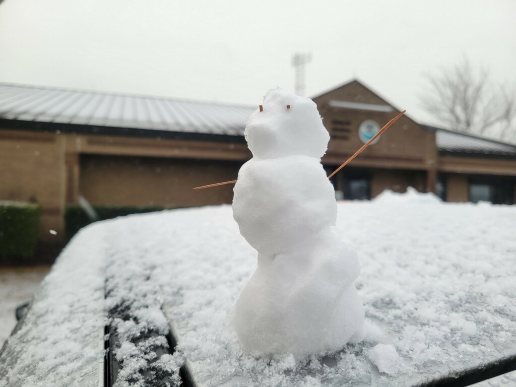 A photo of a snowman on a car at the National Weather Service office in Newport on January 29, 2022