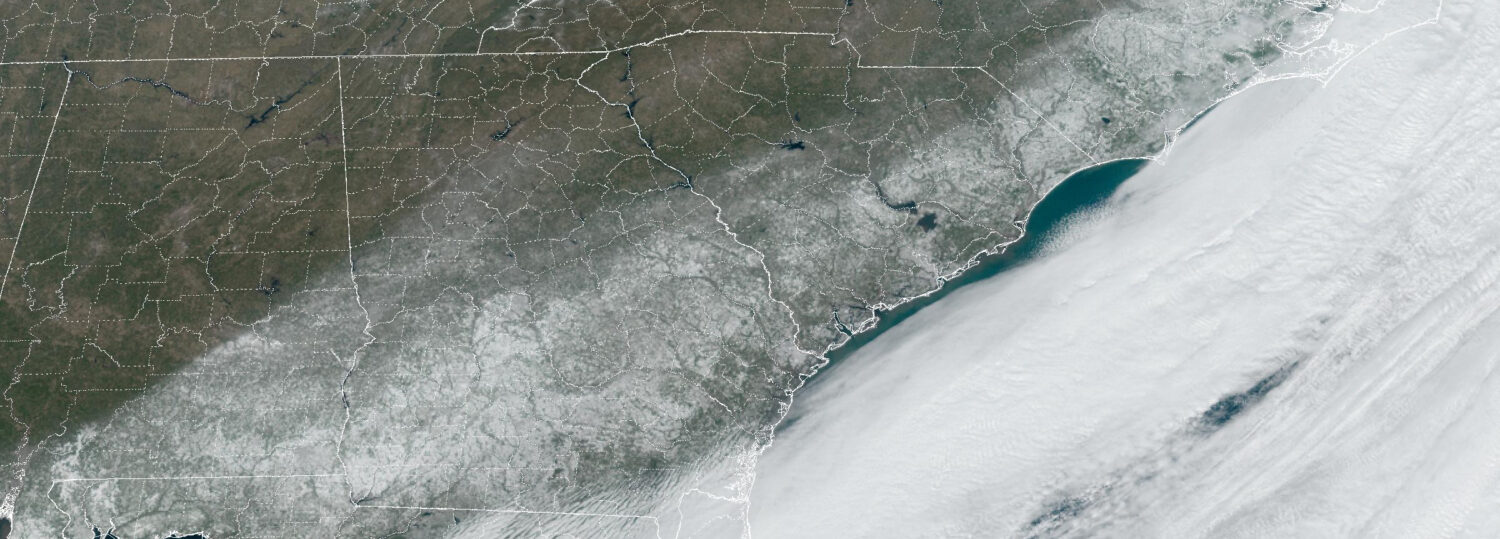 A satellite image showing snow on the ground across the Southeastern Coastal Plain on January 22