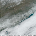 A satellite image showing snow on the ground across the Southeastern Coastal Plain on January 22