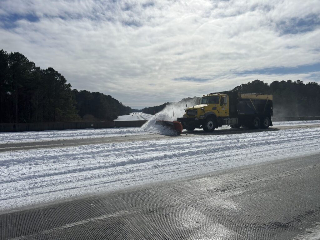 A photo of a plow on a road in Pender County after the January 22 snow event