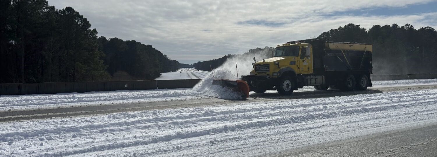 A photo of a plow on a road in Pender County after the January 22 snow event