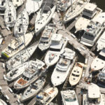 A photo of boats piled up at the marina in Southport following Hurricane Isaias