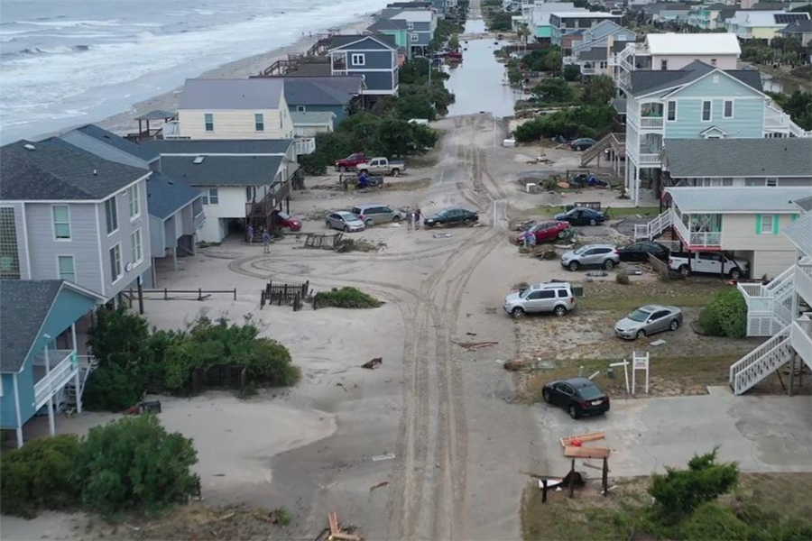 A photo of flooding and overwash on Oak Island after Hurricane Isaias