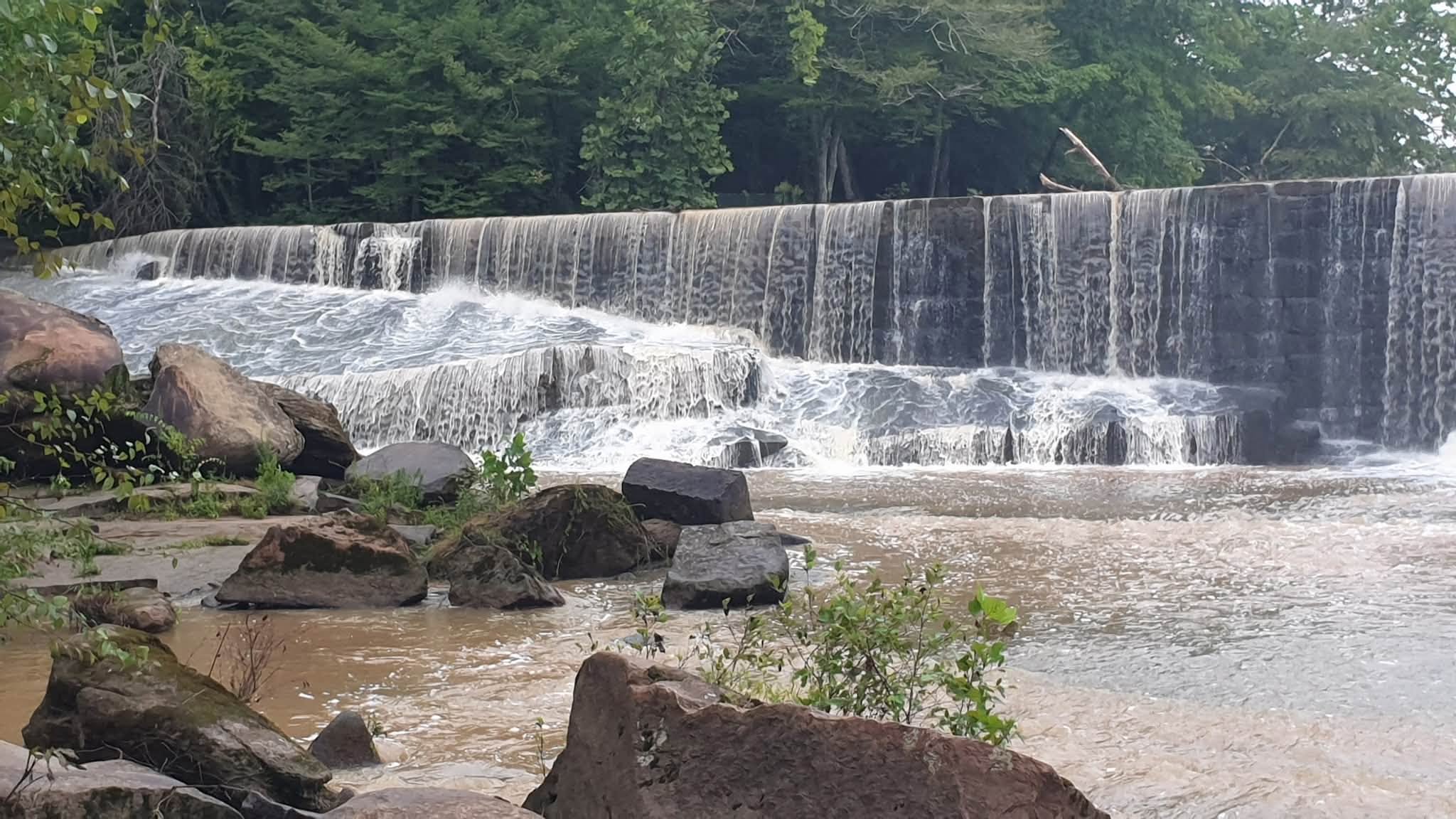A photo of a roaring waterfall at Cooleemee Falls